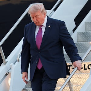 U.S. President Donald Trump deboards the new Air Force One, a plane gifted by Qatar, upon arrival at Ellsworth Air Force Base in Belle Fourche-Cheyenne Valleys, South Dakota, U.S., July 3, 2026. REUTERS/Kylie Cooper