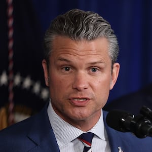 PALM BEACH, FLORIDA - JANUARY 03: U.S. Secretary of War Pete Hegseth speaks during a press conference with U.S. President Donald Trump at Mar-a-Lago club on January 03, 2026, in Palm Beach, Florida. During the event, President Trump confirmed that the U.S. military carried out a large-scale strike in Caracas overnight, resulting in the capture of Venezuelan leader Nicolas Maduro and his wife, Cilia Flores.  (Photo by Joe Raedle/Getty Images)