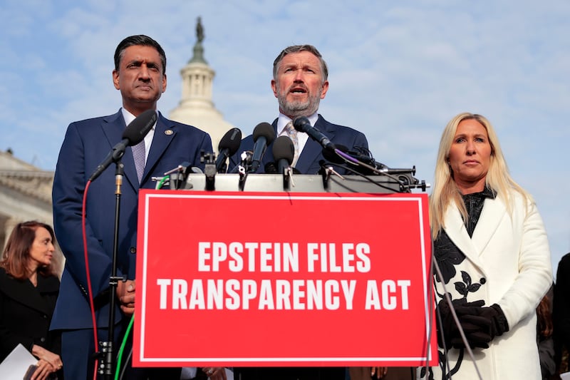 U.S. Rep. Thomas Massie (R-KY) (C) speaks alongside U.S. Rep. Ro Khanna (D-CA) (L) and Rep. Marjorie Taylor Greene (R-GA) during a news conference on the Epstein Files Transparency Act outside the U.S. Capitol on November 18, 2025 in Washington, DC.