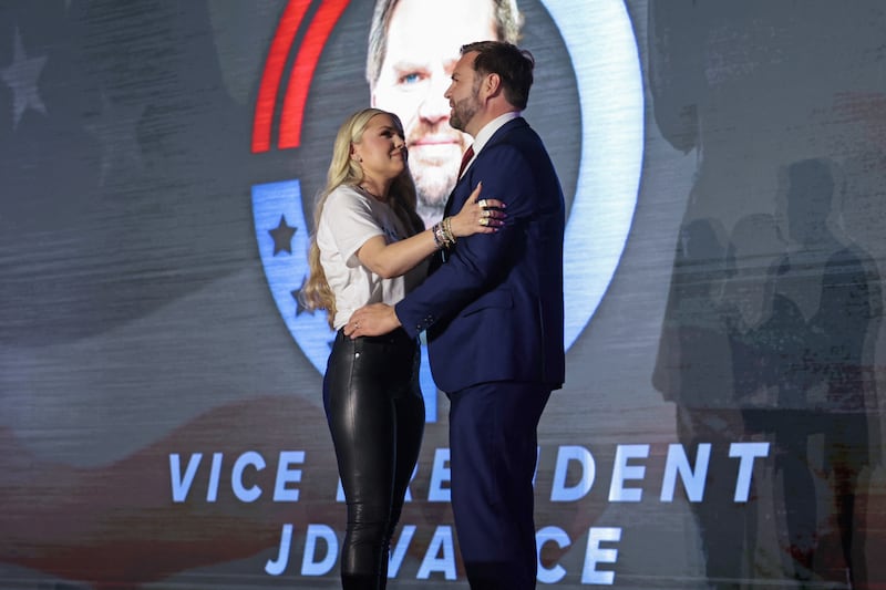 US Vice President JD Vance (R) greets Erika Kirk, Charlie Kirk's widow.