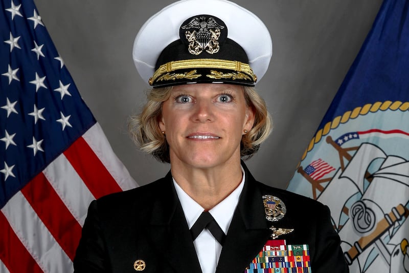 Captain Amy Bauernschmidt, commanding officer of the U.S. Navy aircraft carrier USS Abraham Lincoln, poses in an undated photograph.   U.S. Navy/Handout via REUTERS.  THIS IMAGE HAS BEEN SUPPLIED BY A THIRD PARTY. THIS PICTURE WAS PROCESSED BY REUTERS TO ENHANCE QUALITY. AN UNPROCESSED VERSION HAS BEEN PROVIDED SEPARATELY