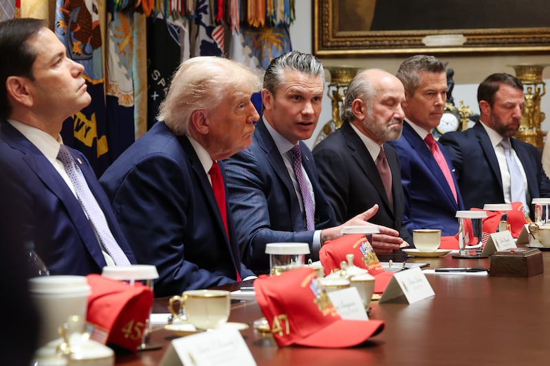 Secretary of War Pete Hegseth (C) speaks as (L-R) Secretary of State Marco Rubio, President Donald Trump, Commerce Secretary Howard Lutnick, Transportation Secretary Sean Duffy and Secretary of Homeland Security Markwayne Mullin listen during a Cabinet meeting in the Cabinet Room of the White House on May 27, 2026 in Washington, DC.