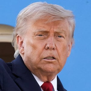 U.S. President Donald Trump gestures as he boards Air Force One at Geneva Airport following the G7 summit in nearby Evian (France), in Geneva, Switzerland, June 17, 2026. Martial Trezzini/Pool via REUTERS