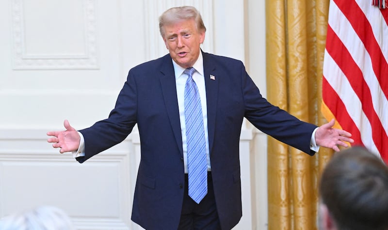 U.S. President Donald Trump gestures after speaking about election security during an address to the nation from the East Room of the White House in Washington, D.C..