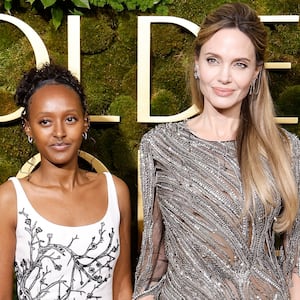 Zahara Jolie and Angelina Jolie attend the 2025 Golden Globe Awards at The Beverly Hilton on January 05, 2025 in Beverly Hills, California.