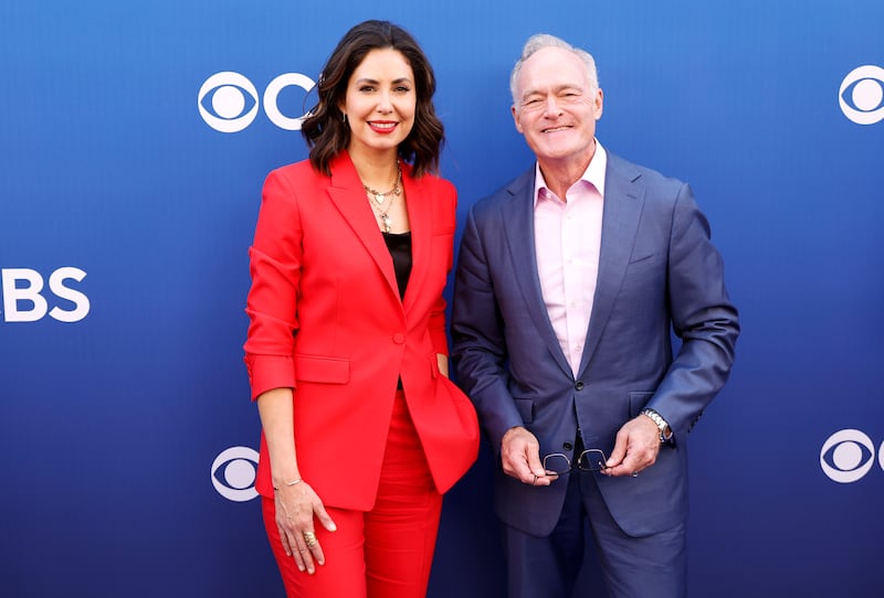 Scott Pelley poses with his fellow '60 Minutes' correspondent Cecilia Vega, who was fired last week.