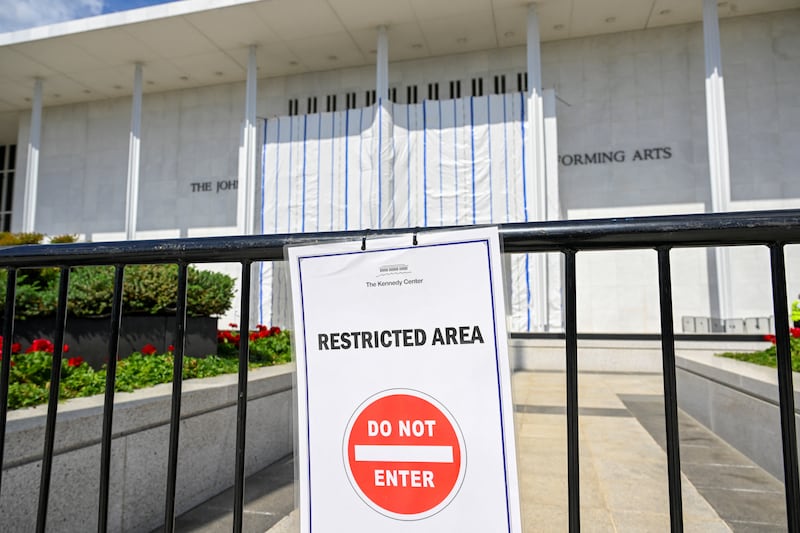 A tarp covers the facade of the John F. Kennedy Memorial Center for the Performing Arts, following a federal judge’s order to remove U.S. President Donald Trump's name from the institution, in Washington, D.C., U.S., June 20, 2026.