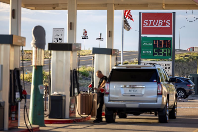 A driver fills up his vehicle at a gas station in Wiggins, Colorado, U.S., May 11, 2026.