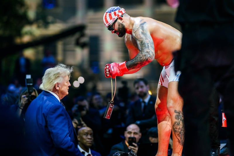 Josh Hokit speaks with U.S. President Donald J. Trump following his win in a heavyweight fight during the UFC Freedom 250 event on the South Lawn at the White House on June 14, 2026 in Washington, DC, United States.