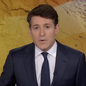 Tony Dokoupil presents a special broadcast covering the U.S. and Israel attacks on Iran in a suit and tie from his anchor desk.
