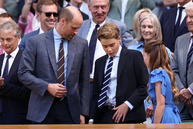 Prince George and Prince William wear striped ties and suits while attending the 2026 Wimbledon finals.
