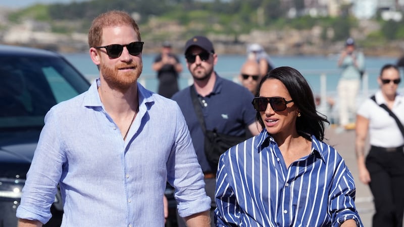 Britain's Prince Harry and Meghan, the Duke and Duchess of Sussex, arrive to meet volunteer first responders from Bondi Surf Bathers' Life Saving Club, during a visit to Bondi Beach, on day four of the royal trip to Australia, April 17, 2026.