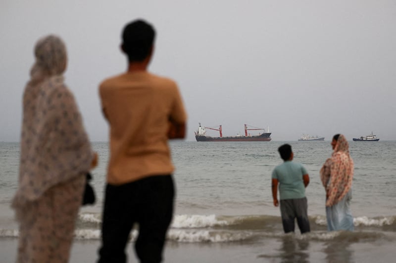 FILE PHOTO: Vessels in the Strait of Hormuz are visible near the beach of Bandar Abbas, Iran, May 22, 2026. Majid Asgaripour/WANA (West Asia News Agency) via REUTERS ATTENTION EDITORS - THIS PICTURE WAS PROVIDED BY A THIRD PARTY/File Photo