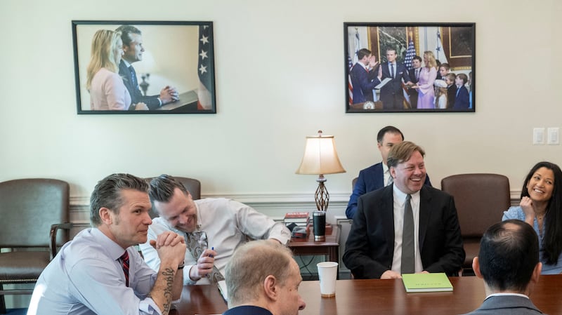 U.S. Secretary of Defense Pete Hegseth welcomes Elon Musk as a visitor to the Pentagon in Arlington, Virginia, U.S. March 21, 2025.