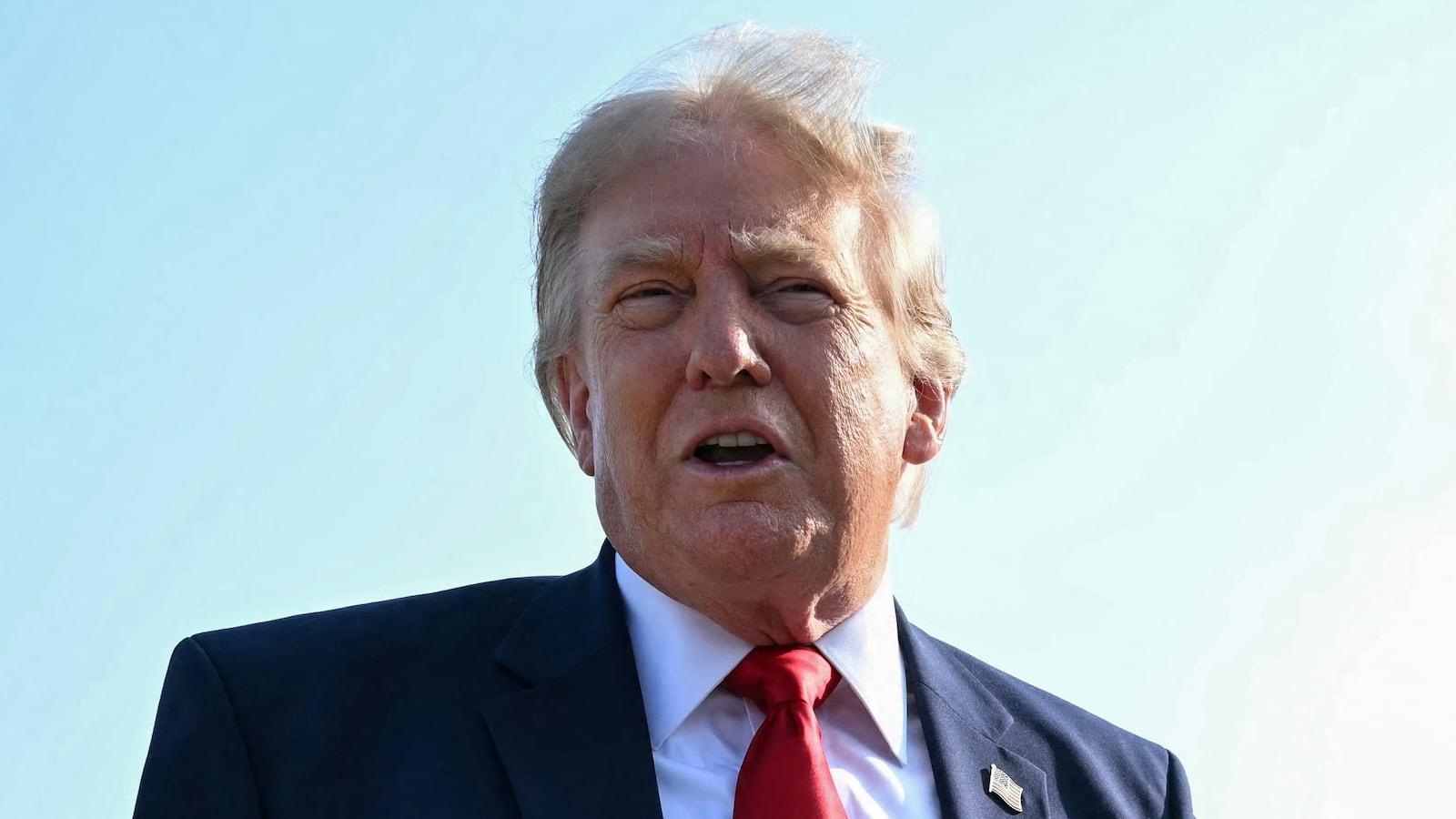 US President Donald Trump speaks to the press before he boards Air Force One for his first flight aboard the Boeing 747-8 that Qatar gifted the United States to use for executive travel, at Joint Base Andrews, in Maryland, July 1, 2026. President Trump is traveling to Medora, North Dakota to participate in the Theodore Roosevelt Presidential Library Opening Ceremony. (Photo by SAUL LOEB / AFP via Getty Images)