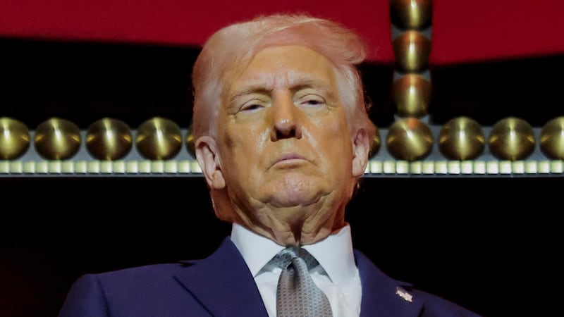 U.S. President Donald Trump gestures stands at the presidential box at the Kennedy Center, in Washington, D.C., U.S., March 17, 2025. REUTERS/Carlos Barria