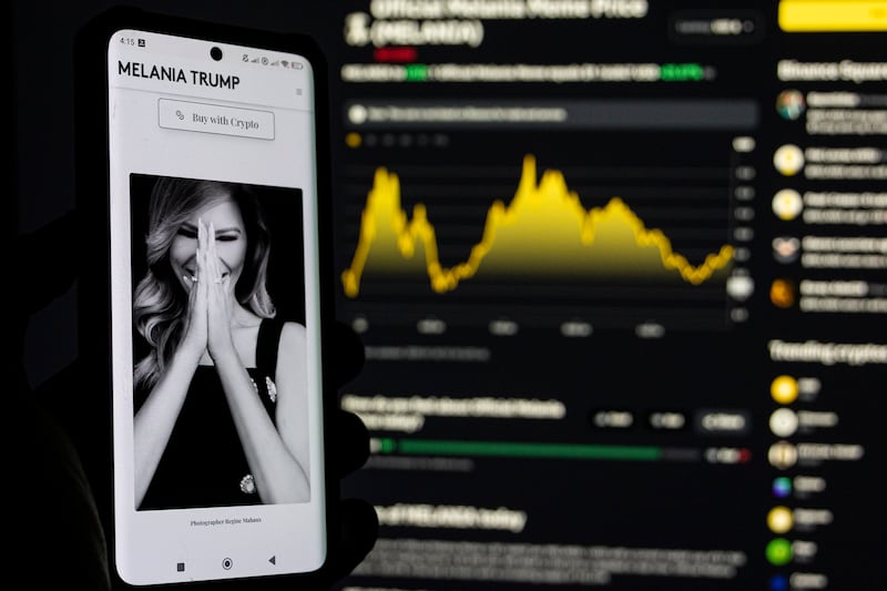 Photo illustration of Melania Meme, a memecoin launched by Melania Trump displayed on a smartphone and a computer screen with the current price charts showed from Binance cryptocurrency exchange page. January 20, 2024 in Amsterdam, the Netherlands  (Photo by Nicolas Economou/NurPhoto via Getty Images)