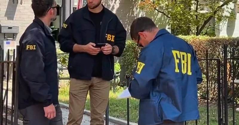 FBI agents outside Lindsey Graham's DC home.