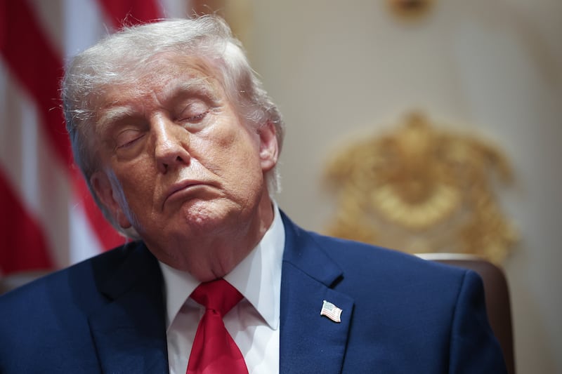 President Donald Trump listens to members of his Cabinet speak during a meeting in the Cabinet Room of the White House on May 27, 2026 in Washington, DC.