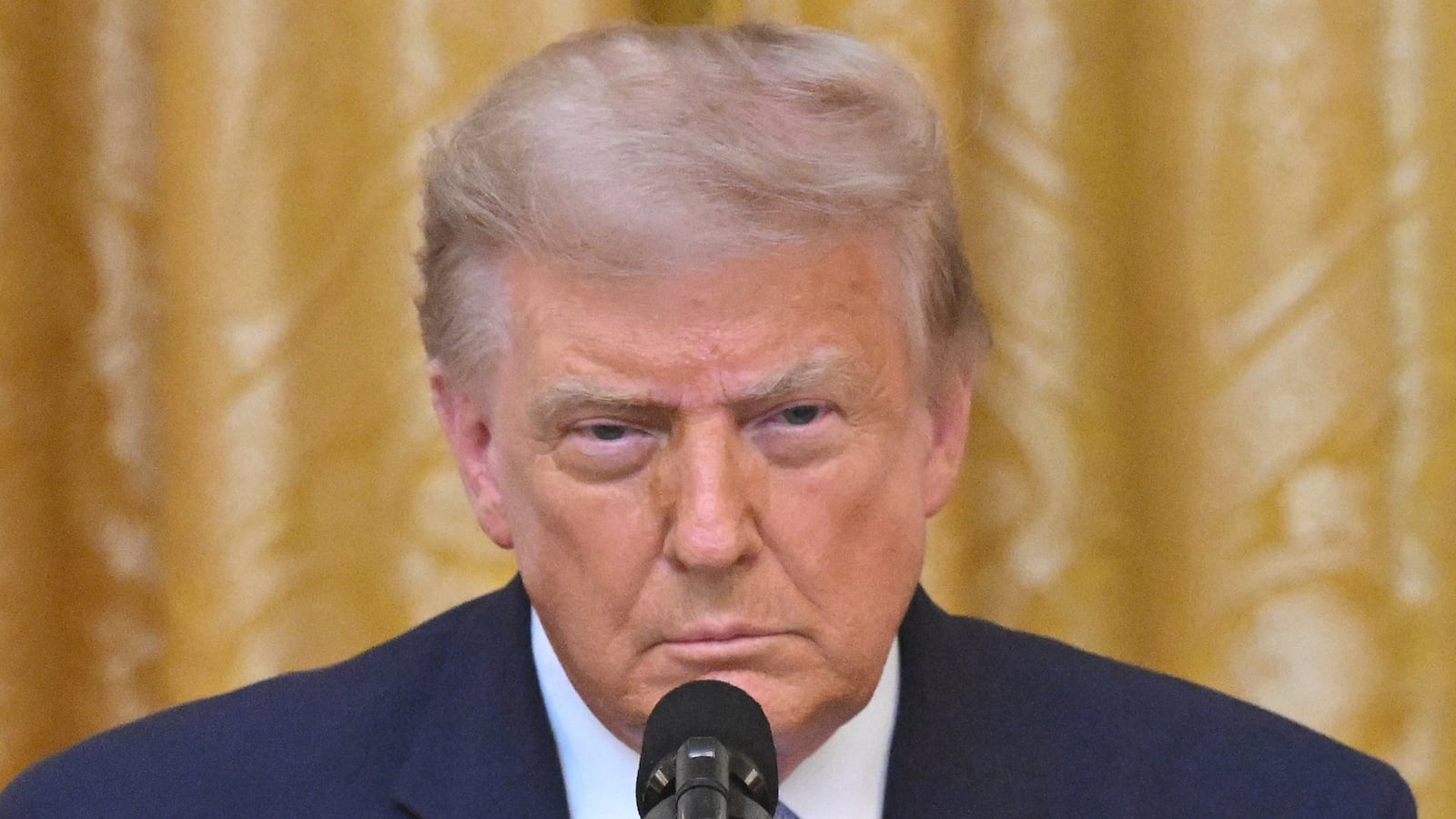 U.S. President Donald Trump speaks about election security during an address to the nation from the East Room of the White House in Washington, D.C., U.S., July 16, 2026.     SAUL LOEB/Pool via REUTERS