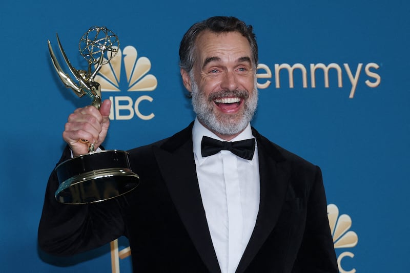 Murray Bartlett poses with his award for Outstanding Supporting Actor in a Limited or Anthology Series or Movie for "The White Lotus"  at the 74th Primetime Emmy Awards