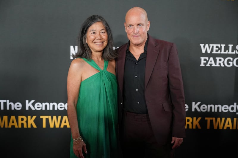 Woody Harrelson and Laura Louie