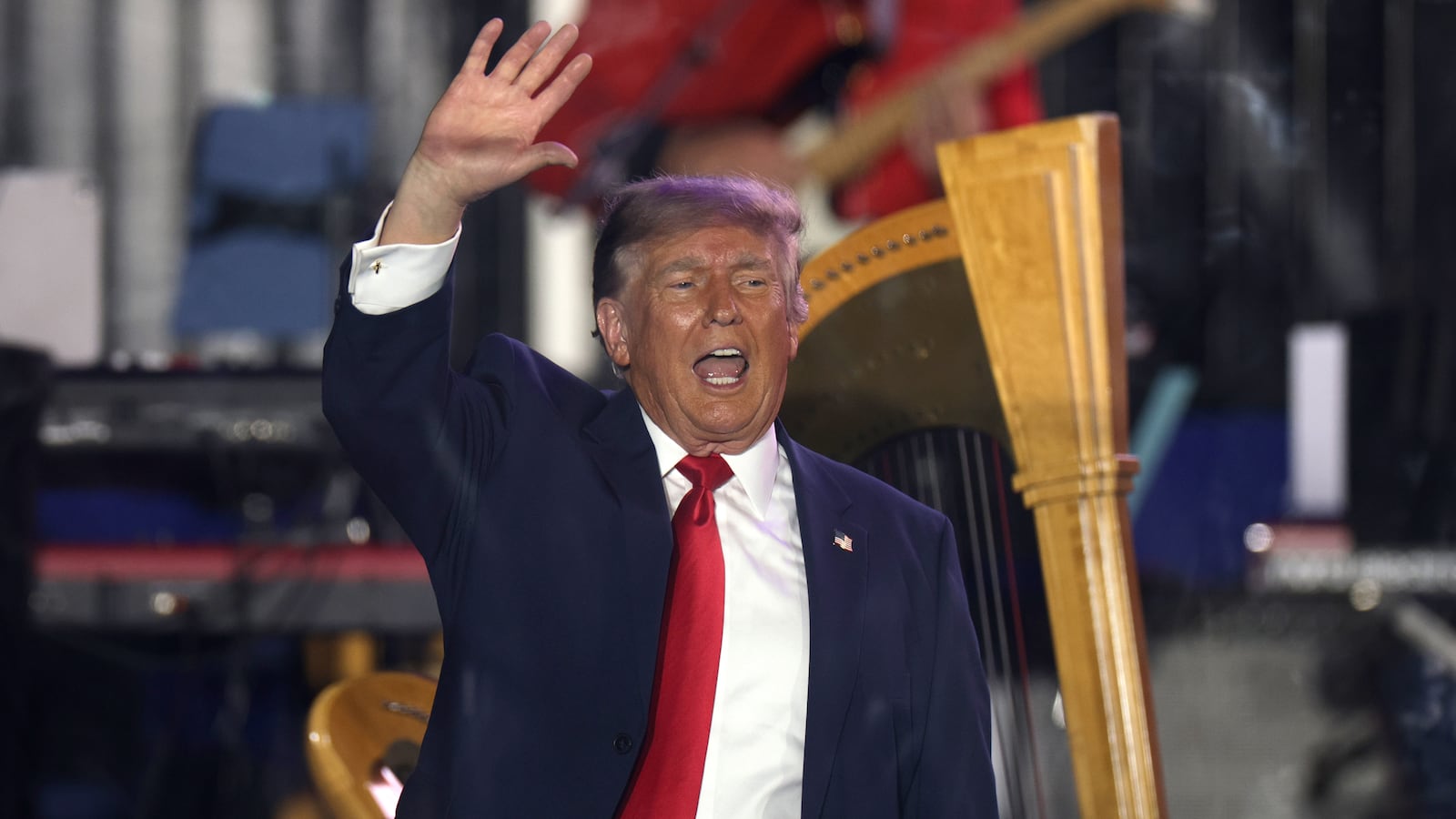President Donald Trump waves to a crowd