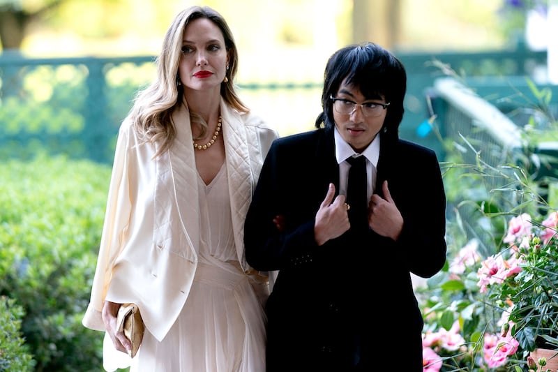 Angelina Jolie (L) and her son Maddox