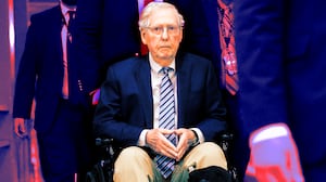 Sen. Mitch McConnell (R-KY) is pushed in a wheelchair as he heads for votes at the Capitol on February 18, 2025 in Washington, DC.
