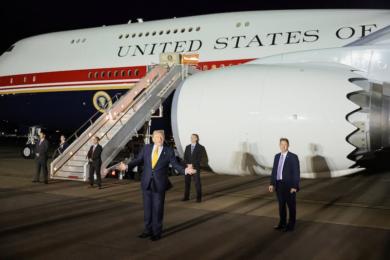In England, Trump boards the new, Qatari-gifted Air Force One after arriving on one of the older planes operating as Air Force One.