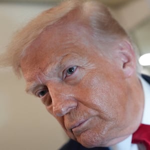 U.S. President Donald Trump looks on as he speaks to members of the media on board Air Force One while flying from Joint Base Andrews to Chippewa Valley Regional Airport in Eau Claire, Wisconsin, U.S., June 5, 2026. REUTERS/Nathan Howard