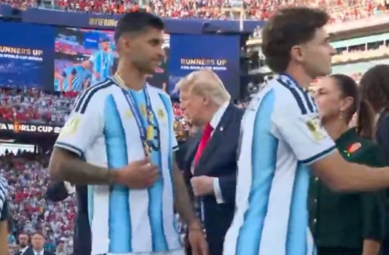 Christian Romero walks past Trump without shaking his hand.